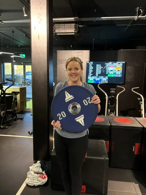 Gemma holding the weight she lost
