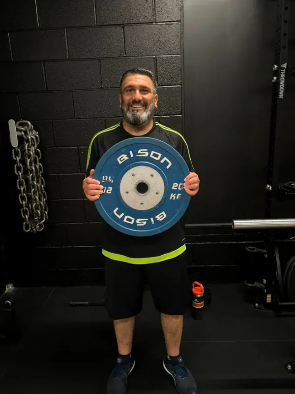 Mo holding the weight he lost
